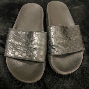 Gucci Embossed Black Slides